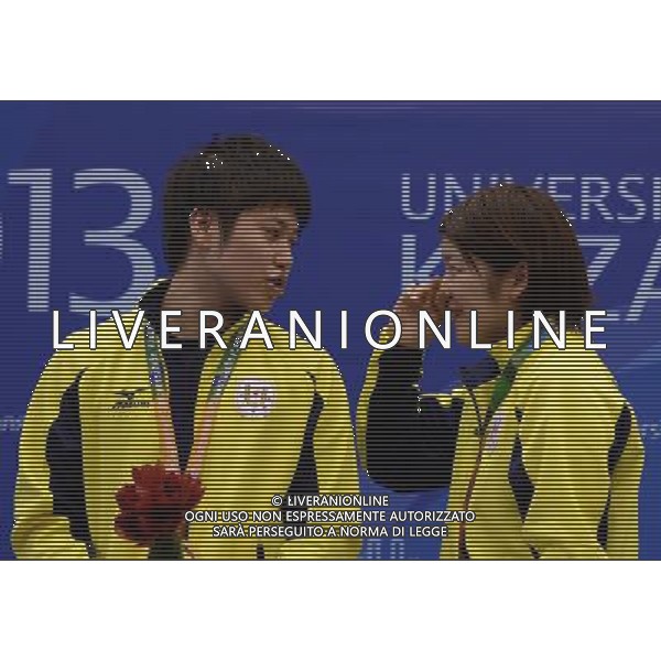 (130714) -- KAZAN, July 14, 2013 () -- Hiromitsu Kasahara (L) and Rika Suzuki of Japan pose during the awarding ceremony after the table tennis mixed doubles final match against Koki Niwa and Misato Niwa of Japan at the 27th Summer Universiade in Kazan, Russia, July 13, 2013. Hiromitsu Kasahara and Rika Suzuki won 4-2. (/Kong Hui) (jyc) ©PHOTOSHOT/AGENZIA ALDO LIVERANI SAS - ITALY ONLY - EDITORIAL USE ONLY