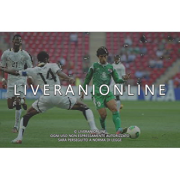 (130714) -- ISTANBUL, July 14, 2013 () -- Lawrence Lartey (C) of Ghana vies with Mahdi Kamil (R) of Iraq during the the third-place football match between Ghana and Iraq at the FIFA U-20 World Cup in Istanbul, Turkey, July 13, 2013. Ghana won 3-0. (/Lu Zhe) (jyc) ©photohsot/AGENZIA ALDO LIVERANI SAS - ITALY ONLY - Ghana Vs Iraq durante la partita per terzo posto ai campioanti mondiali di calcio U-20 a Istanbul, in Turchia, 13 Luglio 2013. il Ghana ha vinto 3-0.