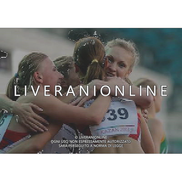 (130713) -- KAZAN, July 13, 2013 () -- Athletes of Russia celebrate after the women\'s 4x400 relay final at the 27th Summer Universiade in Kazan, Russia, July 12, 2013. Team Russia won the gold with 3 minutes and 26.61 seconds. (/Li Ying) (jyc) AG ALDO LIVERANI SAS ONLY ITALY