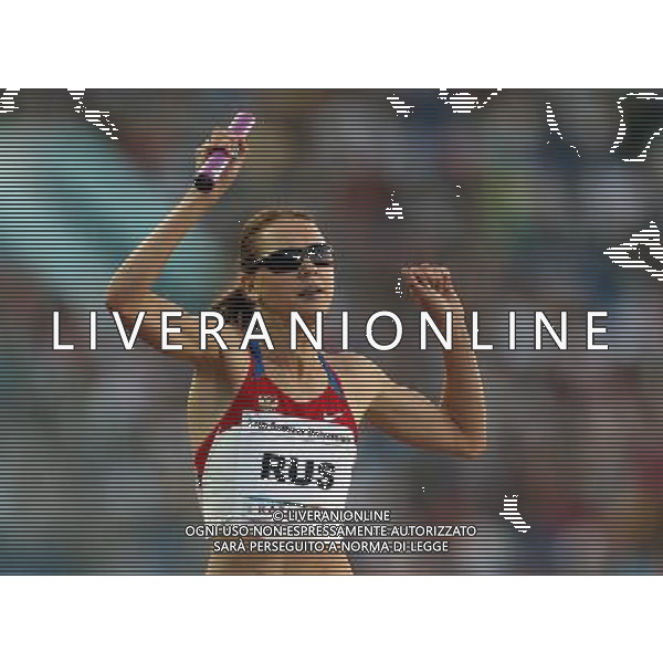 (130713) -- KAZAN, July 13, 2013 () -- Ksenia Ustalova of Russia competes during the women\'s 4x400 relay final at the 27th Summer Universiade in Kazan, Russia, July 12, 2013. Team Russia won the gold with 3 minutes and 26.61 seconds. (/Li Ying) (jyc) AG ALDO LIVERANI SAS ONLY ITALY