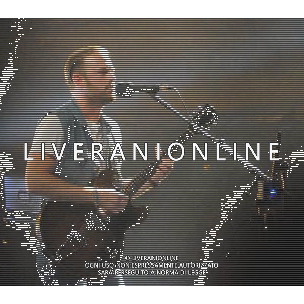 (130715) -- LISBON, July 15, 2013 () -- A member of the band Kings of Leon performs at the Optimus Alive Music Festival in Lisbon, capital of Portugal on July 14, 2013. The three-day Optimus Alive Music Festival closed in Alges on the outskirts of Lison on Sunday. (/Zhang Liyun)(axy) ©photoshot/AGENZIA ALDO LIVERANI SAS - ITALY ONLY - La tre giorni di Optimus Alive Music Festival di Musica a Lisbona, Portogallo, il 14 luglio 2013.