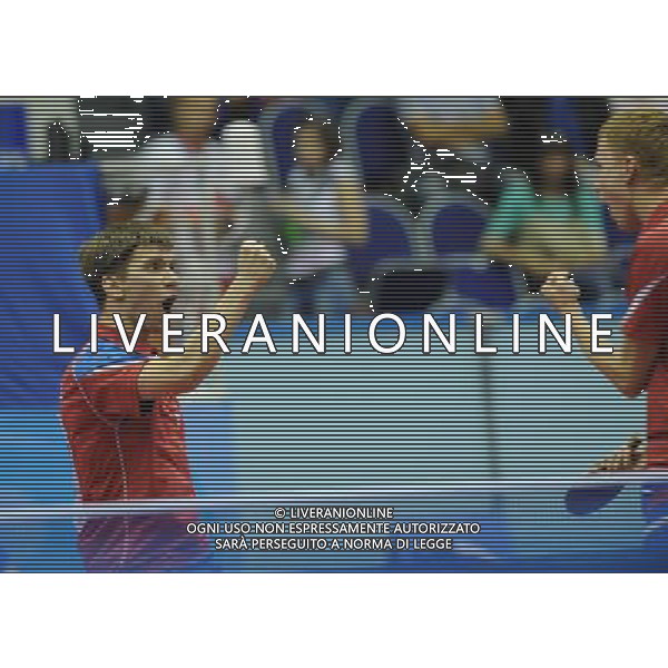 (130715) -- KAZAN, July 15, 2013 () -- Mikhail Paykov (L) and Viacheslav Burov of Russia celebrate after scoring during the table tennis men\'s doubles final match against Chiang Hung Chieh and Huang Sheng Sheng of Chinese Taipei at the 27th Summer Universiade in Kazan, Russia, July 14, 2013. Mikhail Paykov and Viacheslav Burov lost 1-4. (/Jiang Kehong) (jyc) ©photoshot/AGENZIA ALDO LIVERANI SAS - ITALY ONLY - EDITORIAL USE ONLY