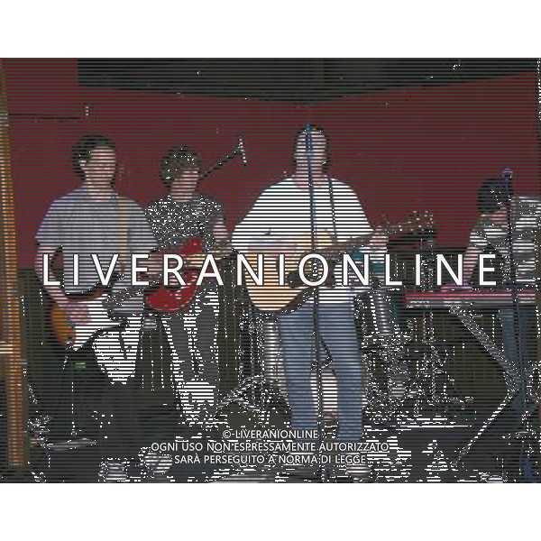 The Liverpool based band features Joe Symes (pictured, vocals)- Vocals/Guitar/Harmonica, Colin White - Drums/Percussion , Paul Hetherington - Guitar/Backing vocals, Dave Skilling - Keyboards/Backing vocals, Chris Giblin - Bass Guitar Joe Symes and the Loving Kind playing at the Retro bar, Manchester, 14/7/14 ©photoshot/AGENZIA ALDO LIVERANI SAS - ITALY ONLY - EDITORIAL USE ONLY