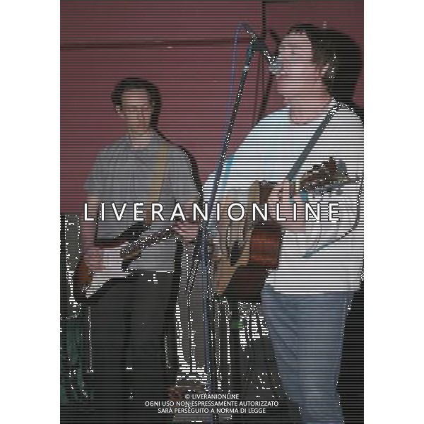 The Liverpool based band features Joe Symes (pictured, vocals)- Vocals/Guitar/Harmonica, Colin White - Drums/Percussion , Paul Hetherington - Guitar/Backing vocals, Dave Skilling - Keyboards/Backing vocals, Chris Giblin - Bass Guitar Joe Symes and the Loving Kind playing at the Retro bar, Manchester, 14/7/14 ©photoshot/AGENZIA ALDO LIVERANI SAS - ITALY ONLY - EDITORIAL USE ONLY