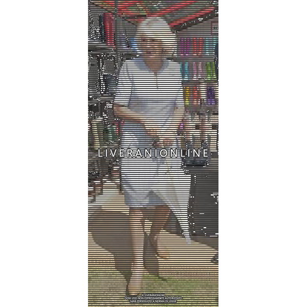 A VERY STYLISH DUCHESS OF CORNWALL AT THE CORONATION FESTIVAL IN THE GROUNDS OF BUCKINGHAM PALACE…ROYAL ROTA. PICTURE MURRAY SANDERS DAILY MAIL… ©photoshot/AGENZIA ALDO LIVERANI SAS - ITALY ONLY - REALI INGLESI: Camilla duchessa di Cornovaglia durante la Festa dell\'Incoronazione nel giardino di Buckingham Palace, nel centro di Londra Inghilterra 11 luglio 2013