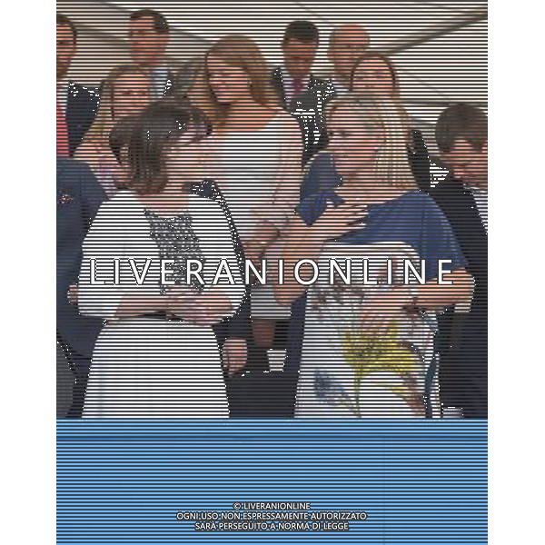 Princess Eugenie (left) and Zara Phillips in the royal box at the Coronation Festival Evening Gala, at Buckingham Palace, in central London. ©photoshot/AGENZIA ALDO LIVERANI SAS - ITALY ONLY - REALI INGLESI: Membri della famiglia reale durante la Festa dell\'Incoronazione nel giardino di Buckingham Palace, nel centro di Londra 11 luglio 2013