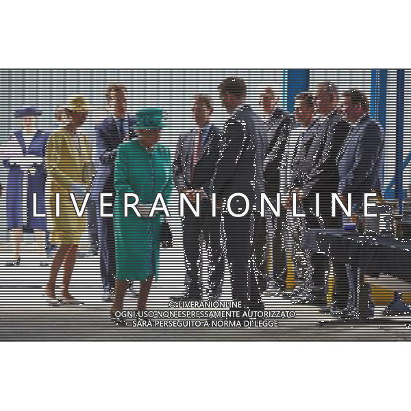James Cropper, which specialises in luxury packaging and other high-quality paper, welcomed the Queen and the Princess Royal to open the new £5m facility in Kendal, Cumbria on 17 July 2013. A 168-year-old British paper company has claimed a world first by opening a plant capable of completely recycling disposable coffee cups that currently end up in landfill or incinerators. ©PHOTOSHOT/AGENZIA ALDO LIVERANI SAS - ITALY ONLY - REALI INGLESI: La Regina Elisabetta II d\'inghilterra all\'apertura di un nuovo impianto di riciclaggio a Kendal, Cumbria, il 17 luglio 2013
