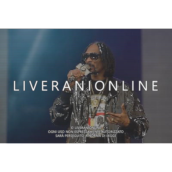  Pictured is: Snoop Dogg (aka Snoop Lion) performing live on the Main Stage at the 20th Anniversary of T In The Park Festival, Balado, Kinross-Shire, Scotland, UK. 13th July 2013 ©PHOTOSHOT/AGENZIA ALDO LIVERANI SAS - ITALY ONLY - EDITORIAL USE ONLY