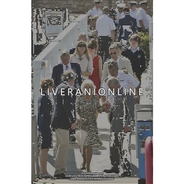The Duchess of Cornwall is helped down a steep ramp on a pontoon by her husband the Prince of Wales at Brixham Marina in the Devonshire fishing port of Brixham as the Duchess and the Prince take part in their annual summer visit to Cornwall and Devon. ©photoshot/AGENZIA ALDO LIVERANI SAS - ITALY ONLY - REALI INGLESI : Il principe Carlo d\'inghiletrra con la moglie Camilla al West Country durante la loro visita estiva annuale in Cornovaglia e Devon.