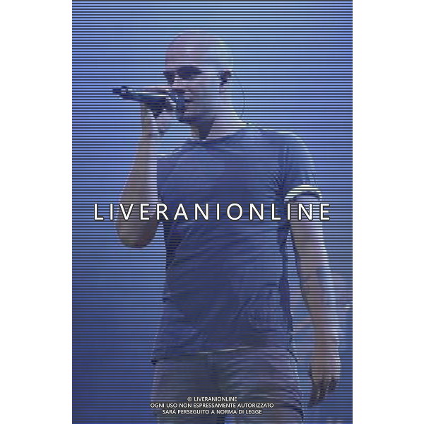 Max George of The Wanted (Siva Kaneswaran, Nathan Sykes, Tom Parker, Max George \' Jay McGuiness) performs on stage at Rochester Castle, Rochester, Kent on Thursday 18 July 2013. ©PHOTOSHOT/AGENZIA ALDO LIVERANI SAS - ITALY ONLY - EDITORIAL USE ONLY