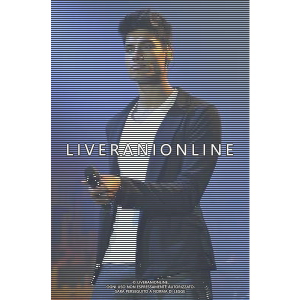 Siva Kaneswaran of The Wanted (Siva Kaneswaran, Nathan Sykes, Tom Parker, Max George \' Jay McGuiness) performs on stage at Rochester Castle, Rochester, Kent on Thursday 18 July 2013. ©PHOTOSHOT/AGENZIA ALDO LIVERANI SAS - ITALY ONLY - EDITORIAL USE ONLY