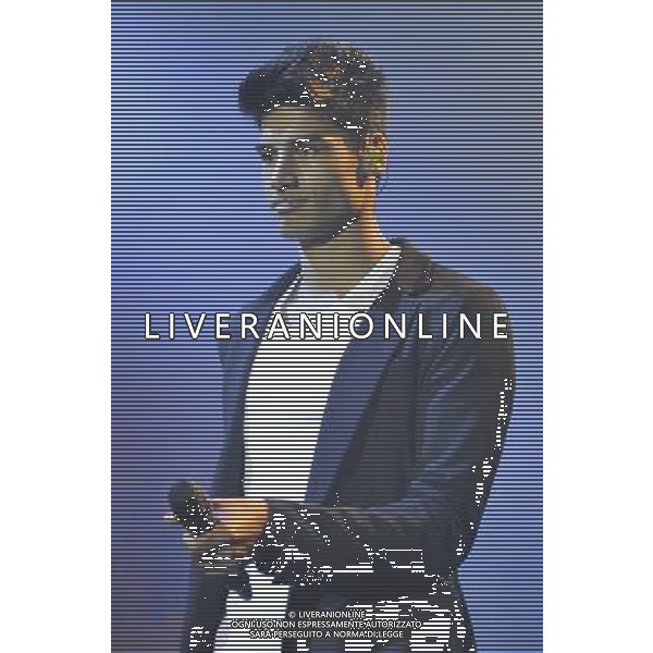 Siva Kaneswaran of The Wanted (Siva Kaneswaran, Nathan Sykes, Tom Parker, Max George \' Jay McGuiness) performs on stage at Rochester Castle, Rochester, Kent on Thursday 18 July 2013. ©PHOTOSHOT/AGENZIA ALDO LIVERANI SAS - ITALY ONLY - EDITORIAL USE ONLY
