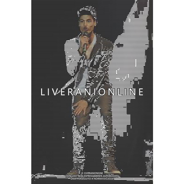 Siva Kaneswaran of The Wanted (Siva Kaneswaran, Nathan Sykes, Tom Parker, Max George \' Jay McGuiness) performs on stage at Rochester Castle, Rochester, Kent on Thursday 18 July 2013. ©PHOTOSHOT/AGENZIA ALDO LIVERANI SAS - ITALY ONLY - EDITORIAL USE ONLY