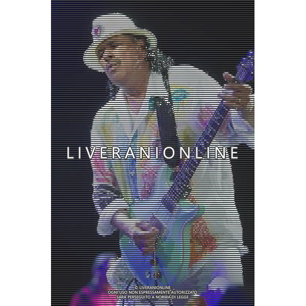 Mexican/American guitarist Carlos Santana (born Carlos Augusto Alves Santana) performs at Wembley Arena, London, England, UK on 19th July 2013. ©PHOTOSHOT/AGENZIA ALDO LIVERANI SAS - ITALY ONLY - EDITORIAL USE ONLY
