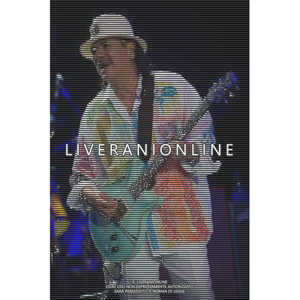 Mexican/American guitarist Carlos Santana (born Carlos Augusto Alves Santana) performs at Wembley Arena, London, England, UK on 19th July 2013. ©PHOTOSHOT/AGENZIA ALDO LIVERANI SAS - ITALY ONLY - EDITORIAL USE ONLY
