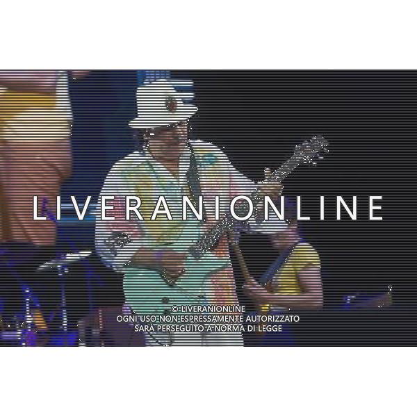 Mexican/American guitarist Carlos Santana (born Carlos Augusto Alves Santana) performs at Wembley Arena, London, England, UK on 19th July 2013. ©PHOTOSHOT/AGENZIA ALDO LIVERANI SAS - ITALY ONLY - EDITORIAL USE ONLY