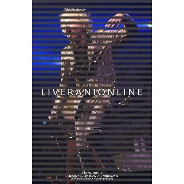 Bob Geldof performs in a fake crocodile skin suit with the Boomtown Rats at Chagstock, a small music festival near Okehampton, Devon. 20 July 2013 ©photoshot/AGENZIA ALDO LIVERANI SAS - ITALY ONLY - EDITORIAL USE ONLY