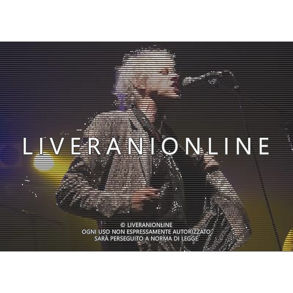 Bob Geldof performs in a fake crocodile skin suit with the Boomtown Rats at Chagstock, a small music festival near Okehampton, Devon. 20 July 2013 ©photoshot/AGENZIA ALDO LIVERANI SAS - ITALY ONLY - EDITORIAL USE ONLY