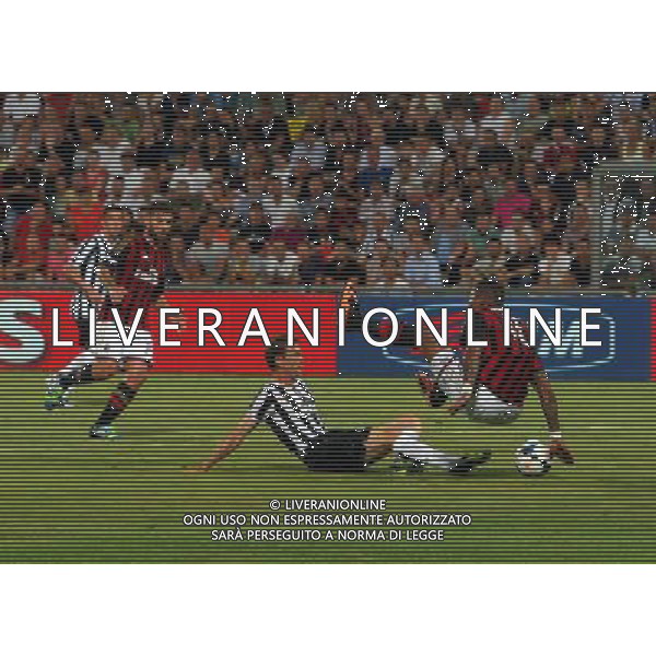 REGGIO EMILIA 23 LUGLIO 2013 /TROFEO TIM 2013 / TRIANGOLARE JUVENTUS-MILAN-SASSUOLO / NELLA FOTO: IL FALLO DA RIGORE DI LICHTSTEIER SU PRINCE / FOTO FRANCESCA SOLI - AGENZIA ALDO LIVERANI SAS