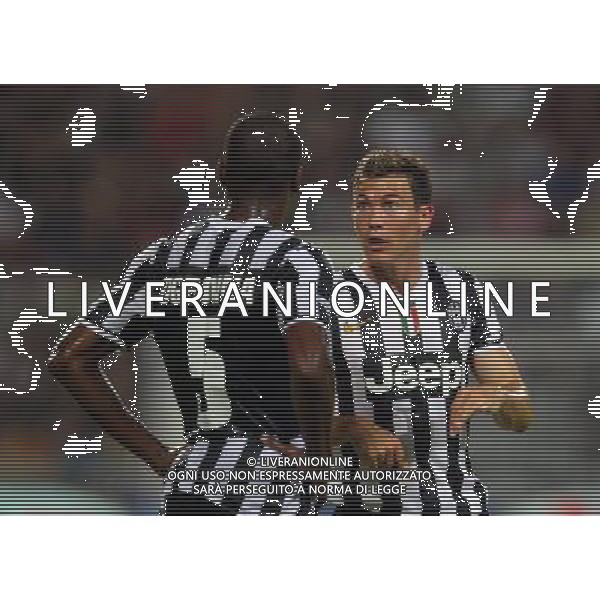 REGGIO EMILIA 23 LUGLIO 2013 /TROFEO TIM 2013 / TRIANGOLARE JUVENTUS-MILAN-SASSUOLO / NELLA FOTO: LICHTSTEINER E OGBONNA / FOTO FRANCESCA SOLI - AGENZIA ALDO LIVERANI SAS