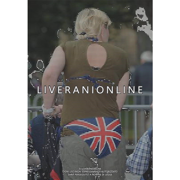 LADY IN UNION JACK BIKINI AWAITS THE ARRIVAL OF THE PRINCE OF WALES AND THE DUCHESS OF CORNWALL VISIT BRIDLINGTON PRIORY TO CELEBRATE ITS 900TH ANNIVERSARY ©photohsot/AGENZIA ALDO LIVERANI SAS - ITALY ONLY - REALI INGLESI: Il Principe Carlo e Camilla Duchessa di Cornovaglia in visita nello Yorkshire