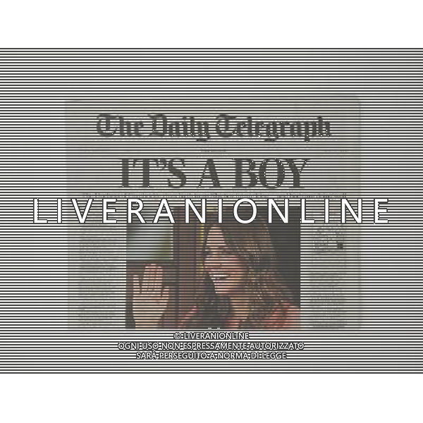 The Daily Telegraph showing the front page with the story of the Duchess of Cambridge ( Kate ) having given birth to a baby boy in St Mary\'s hospital yesterday afternoon, the 22.07.2013 ©PHOTOSHOT/AGENZIA ALDO LIVERANI SAS - ITALY ONLY - REALI INGLESI: Le prime pagine dei giornali inglesi mostrano il Principe William e Kate duchessa di Cambridge dopo aver dato alla luce il bambino nell\'ospedale St Mary a Londra Inghilterra 22 luglio 2013