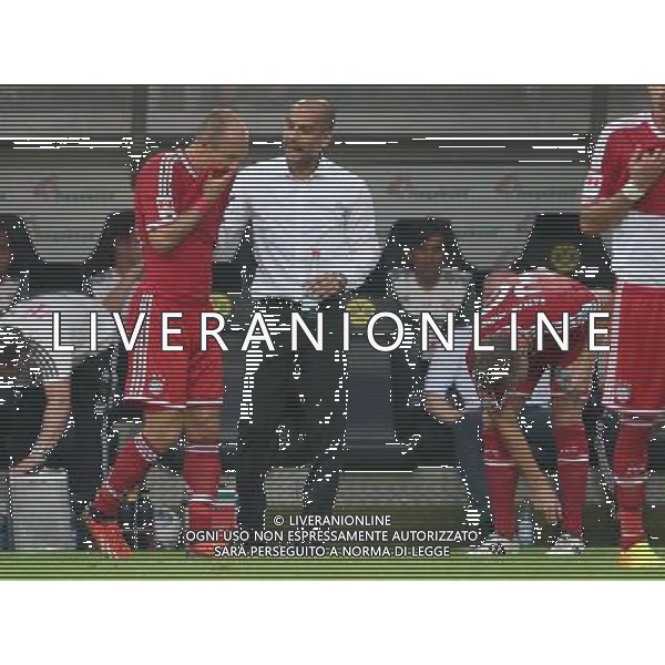 firo FuÃŸball,Fussball, 27.07.2013 1.Bundesliga, Saison 2013/2014 Supercup Finale BVB Borussia Dortmund - FC Bayern MÃ¼nchen Guardiola mit Robben $worldrightsEs gelten unsere AGB, einsehbar auf www.firosportphoto.de copyright by firo sportphoto: Coesfelder Str.207 48249 DÃ¼lmen www.firosportphoto.de mail@firosportphoto.de (V o l k s b a n k B o c h u m - W i t t e n ) BLZ.: 430 601 29 Kt. Nr.: 341 117 100 Tel:Â  02594 - 9916004 Fax:Â 02594 - 9916005 AG ALDO LIVERANI SAS ONLY ITALY