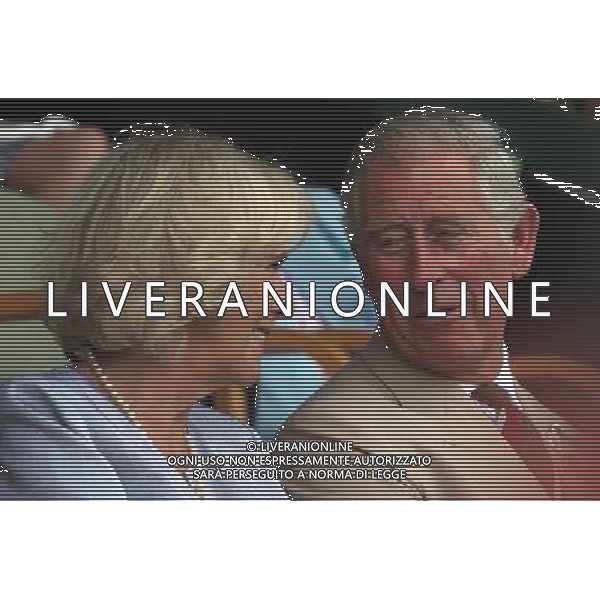 BUILTH WELLS, WALES - JULY 24: The Prince of Wales and Duchess of Cornwall smile as they visit the Royal Welsh Show at Royal Wales Showground on July 24, 2013 in Builth Wells, Wales. ©photohsot/AGENZIA ALDO LIVERANI SAS - ITALY ONLY - REALI INGLESI: Il Principe Carlo d\'Inghilterra e la moglie Camilla Duchessa di Cornovaglia al Royal Welsh Show Showground 24 luglio 2013 in Builth Wells, Galles. 