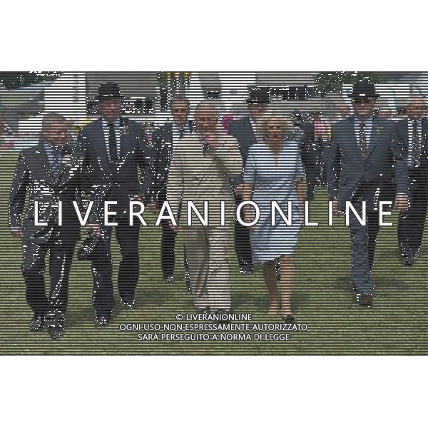 The Prince of Wales and the Duchess of Cornwall in the Main Ring at the Royal Welsh Show in at Llanelwedd, Builth Wells. ©photoshot/AGENZIA ALDO LIVERANI SAS - ITALY ONLY - REALI INGLESI: Il Principe Carlo d\'Inghilterra e la moglie Camilla Duchessa di Cornovaglia al Royal Welsh Show Showground 24 luglio 2013 in Builth Wells, Galles.