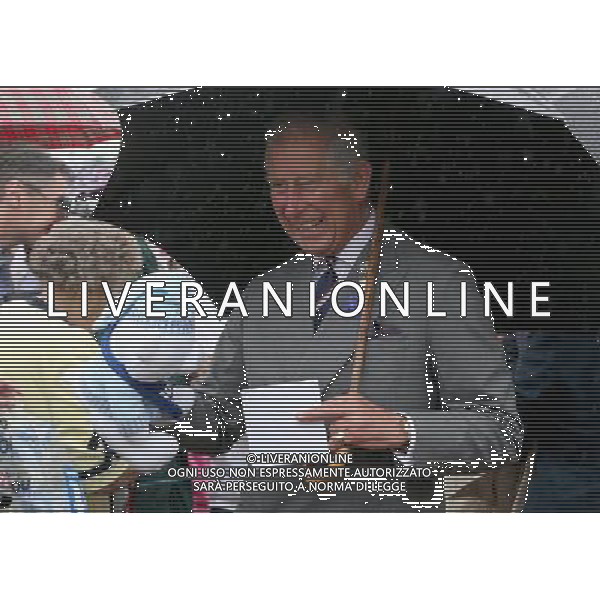 KING\'S LYNN, ENGLAND - JULY 31: Prince Charles, Prince of Wales is presented with a teddy bear for Prince George of Cambridge during a visit to the 132nd Sandringham Flower Show at Sandringham House on July 31, 2013 in King\'s Lynn, England. ©photoshot/AGENZIA ALDO LIVERANI SAS - ITALY ONLY - REALI INGLESI: Il principe Carlo d\'inghilterra con la moglie Camilla duchessa di Cornovaglia