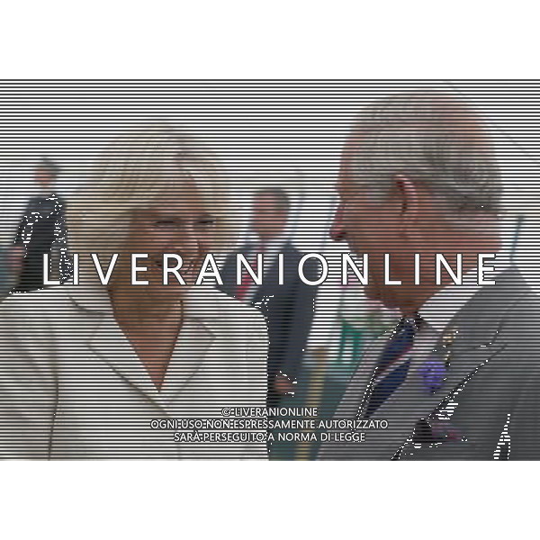 KING\'S LYNN, ENGLAND - JULY 31: Prince Charles, Prince of Wales and Camilla, Duchess of Cornwall laugh during a visit to the 132nd Sandringham Flower Show at Sandringham House on July 31, 2013 in King\'s Lynn, England. ©photoshot/AGENZIA ALDO LIVERANI SAS - ITALY ONLY - REALI INGLESI: Il principe Carlo d\'inghilterra con la moglie Camilla duchessa di Cornovaglia