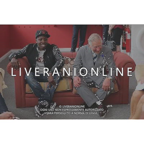 CHATHAM, UNITED KINGDOM - JULY 29: Prince Charles, Prince of Wales sits on a sofa with Jamal Edwards during a live session at the launch of the Prince\'s Trust Summer Sessions at the Princes\'s Trust in Historic Chatham Dockyard on July 29, 2013 in Chatham, United Kingdom. ©photoshot/AGENZIA ALDO LIVERANI SAS - ITALY ONLY - REALI INGLESI: Il principe Carlo d\'inghilterra con la moglie Camilla duchessa di Cornovaglia