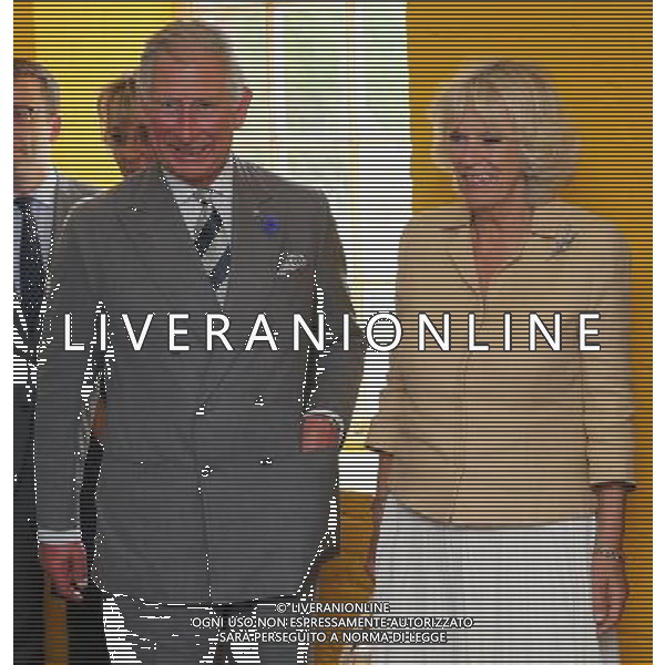 CHATHAM, UNITED KINGDOM - JULY 29: Prince Charles, Prince of Wales and Camilla, Duchess of Cornwall smile during a visit to Chatham Prince\'s Trust at the launch of the Prince\'s Trust Summer Sessions at Historic Chatham Dockyard on July 29, 2013 in Chatham, United Kingdom. ©photoshot/AGENZIA ALDO LIVERANI SAS - ITALY ONLY - REALI INGLESI: Il principe Carlo d\'inghilterra con la moglie Camilla duchessa di Cornovaglia