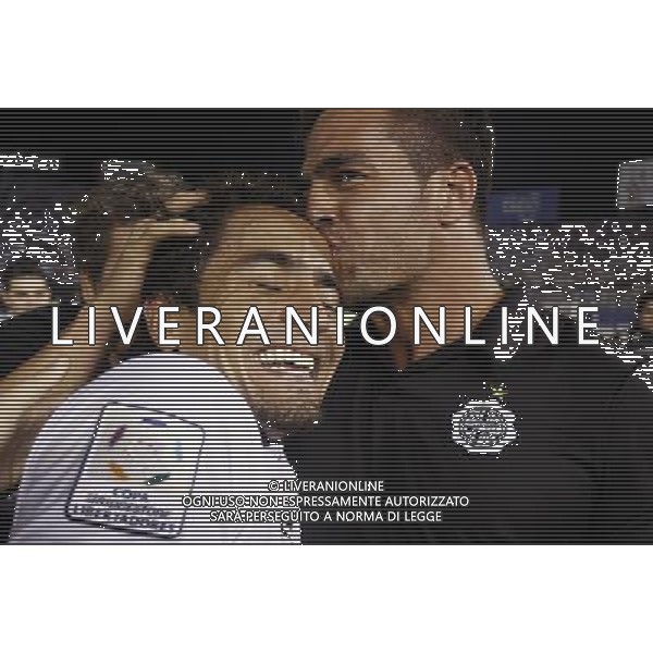 (130718) -- ASUNCION, July 18, 2013 () -- Wilson Pittoni (L) of Paraguay\'s Olimpia celebrates his goal with the Technical Assistant Ivan Almeida against Brazil\'s Atletico Mineiro during the first leg final match of Libertadores Cup, held at Defensores del Chaco Stadium, in Asuncion, capital of Paraguay, on July 17, 2013. (/Rene Gonzalez) (rh) (ah) ©photoshot/AGENZIA ALDO LIVERANI SAS - ITALY ONLY - Atletico Mineiro VS OLIMPIA partita finale Coppa Libertadores presso Stadio Mineirao, a Belo Horizonte, Minas Gerais, Brasile, il 24 luglio 2013. Atletico Mineiro vincitore del trofeo