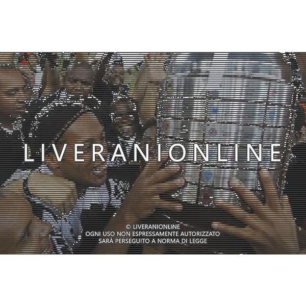 (130725) -- BELO HORIZONTE, July 25, 2013 () -- Ronaldinho (L) of Brazil\'s Atletico Mineiro, celebrates with the trophy of Libertadores Cup during the finals awarding ceremony against Paraguay\'s Olimpia held at Mineirao Stadium, in Belo Horizonte of Minas Gerais State, Brazil, on July 24, 2013. Atletico Mineiro won the match and claim the title. (/Agencia Estado) (rh) (ah) ***BRAZIL OUT*** ©photoshot/AGENZIA ALDO LIVERANI SAS - ITALY ONLY - Atletico Mineiro VS OLIMPIA partita finale Coppa Libertadores presso Stadio Mineirao, a Belo Horizonte, Minas Gerais, Brasile, il 24 luglio 2013. Atletico Mineiro vincitore del trofeo