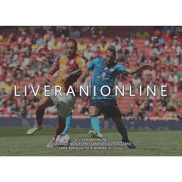 Galatasaray\'s Nordin Amrabat and FC Porto\'s Steven Defour (Photo by Kieran Galvin/CameraSport) Football - The Emirates Cup - Galatasaray v FC Porto - Saturday 3rd August 2013 - The Emirates Stadium - London Œ© CameraSport - 43 Linden Ave. Countesthorpe. Leicester. England. LE8 5PG - Tel: +44 (0) 116 277 4147 - admin@camerasport.com - www.camerasport.com AG ALDO LIVERANI SAS ONLY ITALY