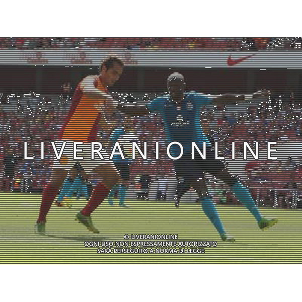 Galatasaray\'s Gokhan Zantakes FC Porto\'s Eliaquim Mangala (Photo by Kieran Galvin/CameraSport) Football - The Emirates Cup - Galatasaray v FC Porto - Saturday 3rd August 2013 - The Emirates Stadium - London å© CameraSport - 43 Linden Ave. Countesthorpe. Leicester. England. LE8 5PG - Tel: +44 (0) 116 277 4147 - admin@camerasport.com - www.camerasport.com AG ALDO LIVERANI SAS ONLY ITALY