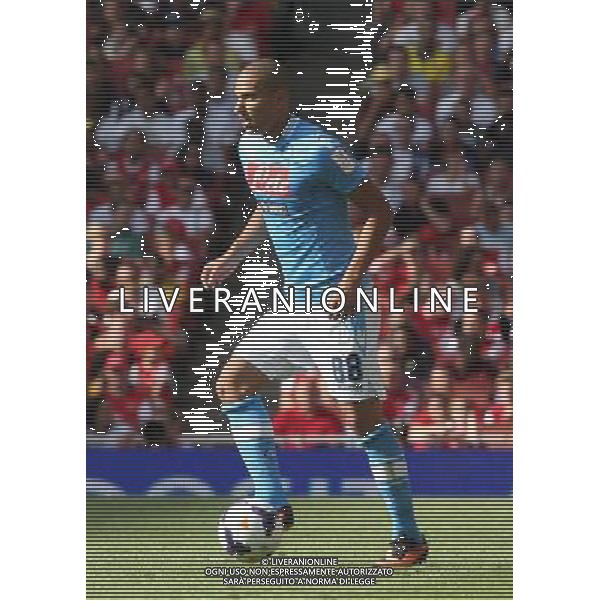 Napoli\'s Gokhan Inler (Photo by Kieran Galvin/CameraSport) Football - The Emirates Cup - Arsenal v Napoli - Saturday 3rd August 2013 - The Emirates Stadium - London å© CameraSport - 43 Linden Ave. Countesthorpe. Leicester. England. LE8 5PG - Tel: +44 (0) 116 277 4147 - admin@camerasport.com - www.camerasport.com AG ALDO LIVERANI SAS ONLY ITALY