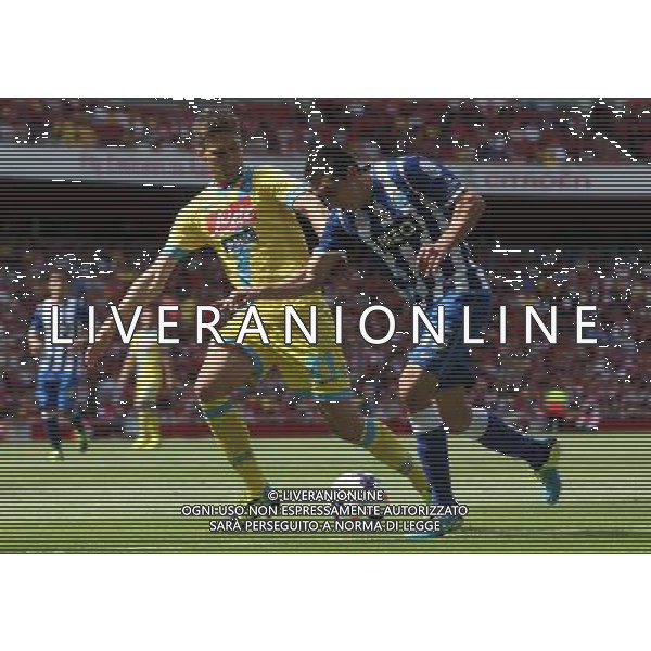 FC Porto\'s Hector Herrera and Napoli\'s Federico Fernandez (Photo by Kieran Galvin/CameraSport) Football - The Emirates Cup - Napoli v FC Porto - Sunday 4th August 2013 - The Emirates Stadium - London Œ© CameraSport - 43 Linden Ave. Countesthorpe. Leicester. England. LE8 5PG - Tel: +44 (0) 116 277 4147 - admin@camerasport.com - www.camerasport.com AG ALDO LIVERANI SAS ONLY ITALY