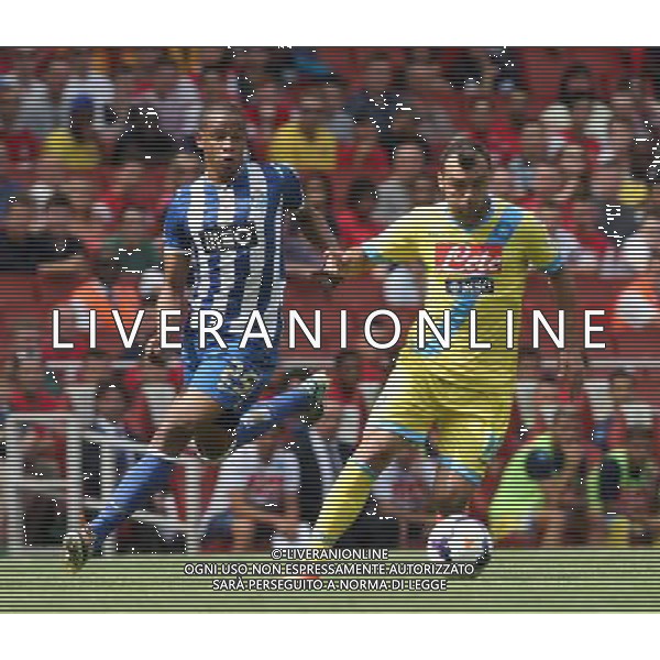 Napoli\'s Goran Pandev and FC Porto\'s Fernando Reges (Photo by Kieran Galvin/CameraSport) Football - The Emirates Cup - Napoli v FC Porto - Sunday 4th August 2013 - The Emirates Stadium - London Œ© CameraSport - 43 Linden Ave. Countesthorpe. Leicester. England. LE8 5PG - Tel: +44 (0) 116 277 4147 - admin@camerasport.com - www.camerasport.com AG ALDO LIVERANI SAS ONLY ITALY