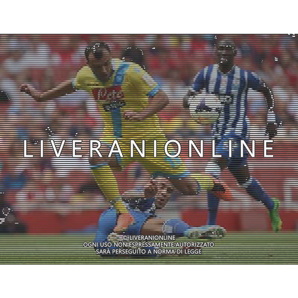 Napoli\'s Goran Pandev and FC Porto\'s Nicolas Otamendi (Photo by Kieran Galvin/CameraSport) Football - The Emirates Cup - Napoli v FC Porto - Sunday 4th August 2013 - The Emirates Stadium - London Œ© CameraSport - 43 Linden Ave. Countesthorpe. Leicester. England. LE8 5PG - Tel: +44 (0) 116 277 4147 - admin@camerasport.com - www.camerasport.com AG ALDO LIVERANI SAS ONLY ITALY
