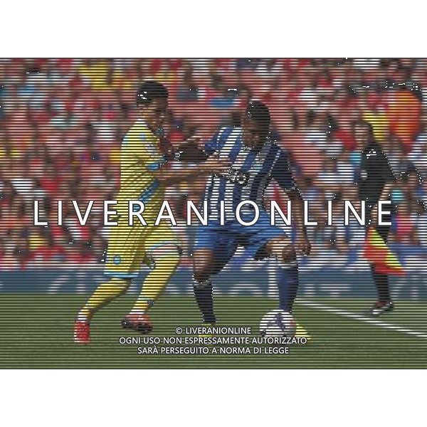 Napoli\'s Jose Callejon and FC Porto\'s Alex Sandro (Photo by Kieran Galvin/CameraSport) Football - The Emirates Cup - Napoli v FC Porto - Sunday 4th August 2013 - The Emirates Stadium - London Œ© CameraSport - 43 Linden Ave. Countesthorpe. Leicester. England. LE8 5PG - Tel: +44 (0) 116 277 4147 - admin@camerasport.com - www.camerasport.com AG ALDO LIVERANI SAS ONLY ITALY