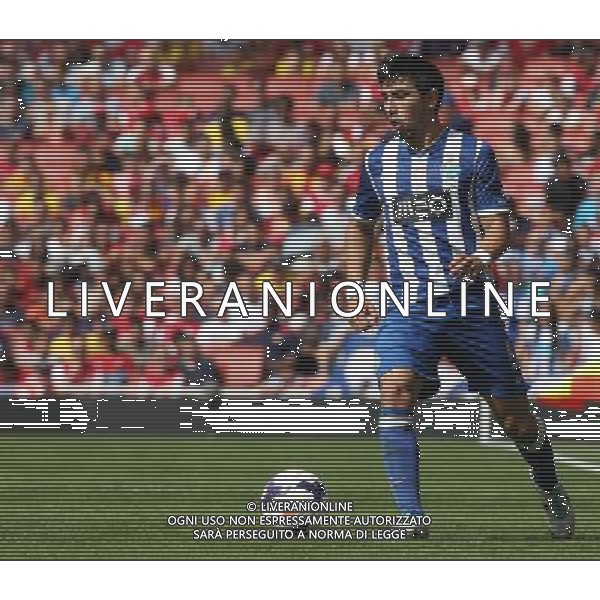 FC Porto\'s Jorge Fucile (Photo by Kieran Galvin/CameraSport) Football - The Emirates Cup - Napoli v FC Porto - Sunday 4th August 2013 - The Emirates Stadium - London å© CameraSport - 43 Linden Ave. Countesthorpe. Leicester. England. LE8 5PG - Tel: +44 (0) 116 277 4147 - admin@camerasport.com - www.camerasport.com AG ALDO LIVERANI SAS ONLY ITALY