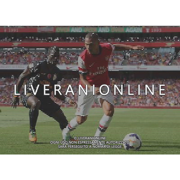 Arsenal\'s Alex Oxlade-Chamberlain holds of Galatasaray\'s Emmanuel Eboue (Photo by Kieran Galvin/CameraSport) Football - The Emirates Cup - Arsenal v Galatasaray - Sunday 4th August 2013 - The Emirates Stadium - London Œ© CameraSport - 43 Linden Ave. Countesthorpe. Leicester. England. LE8 5PG - Tel: +44 (0) 116 277 4147 - admin@camerasport.com - www.camerasport.com AG ALDO LIVERANI SAS ONLY ITALY