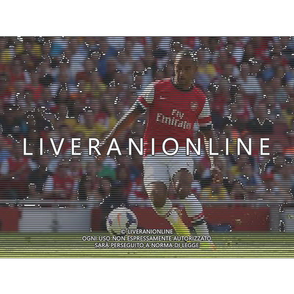 Arsenal\'s Theo Walcott (Photo by Kieran Galvin/CameraSport) Football - The Emirates Cup - Arsenal v Galatasaray - Sunday 4th August 2013 - The Emirates Stadium - London Œ© CameraSport - 43 Linden Ave. Countesthorpe. Leicester. England. LE8 5PG - Tel: +44 (0) 116 277 4147 - admin@camerasport.com - www.camerasport.com AG ALDO LIVERANI SAS ONLY ITALY