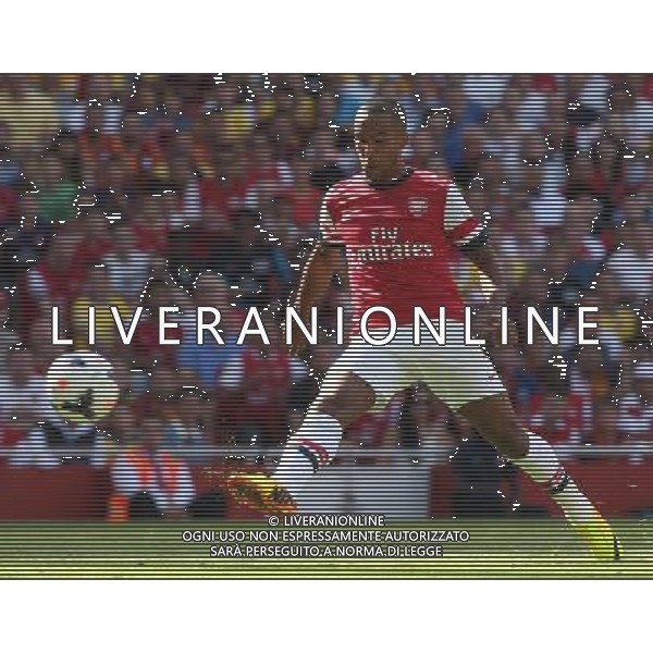 Arsenal\'s Theo Walcott (Photo by Kieran Galvin/CameraSport) Football - The Emirates Cup - Arsenal v Galatasaray - Sunday 4th August 2013 - The Emirates Stadium - London Œ© CameraSport - 43 Linden Ave. Countesthorpe. Leicester. England. LE8 5PG - Tel: +44 (0) 116 277 4147 - admin@camerasport.com - www.camerasport.com AG ALDO LIVERANI SAS ONLY ITALY