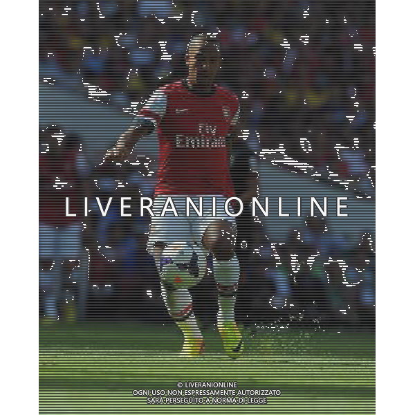 Theo Walcott Arsenal 2013/14 Arsenal V Galatasaray (1-2) 04/08/13 Emirates Cup 2013 Photo: Robin Parker Fotosports International ©PHOTOSHOT/AGENZIA ALDO LIVERANI SAS - ITALY ONLY - EDITORIAL USE ONLY ©photoshot/AGENZIA ALDO LIVERANI SAS - ITALY ONLY - EDITORIAL USE ONLY