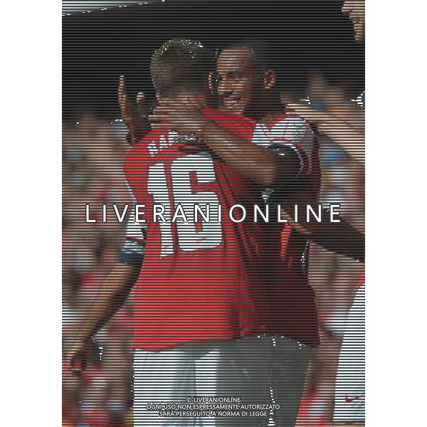 Theo Walcott Celebrates Scoring goal with team mate Aaron Ramsey Arsenal 2013/14 Arsenal V Galatasaray (1-2) 04/08/13 Emirates Cup 2013 Photo: Robin Parker Fotosports International ©PHOTOSHOT/AGENZIA ALDO LIVERANI SAS - ITALY ONLY - EDITORIAL USE ONLY ©photoshot/AGENZIA ALDO LIVERANI SAS - ITALY ONLY - EDITORIAL USE ONLY