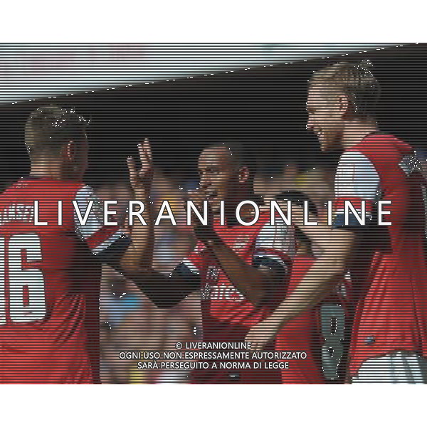 Theo Walcott Celebrates Scoring goal with team mate Aaron Ramsey Arsenal 2013/14 Arsenal V Galatasaray (1-2) 04/08/13 Emirates Cup 2013 Photo: Robin Parker Fotosports International ©PHOTOSHOT/AGENZIA ALDO LIVERANI SAS - ITALY ONLY - EDITORIAL USE ONLY ©photoshot/AGENZIA ALDO LIVERANI SAS - ITALY ONLY - EDITORIAL USE ONLY