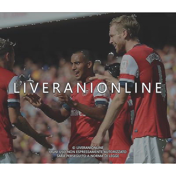 Theo Walcott Celebrates Scoring goal with team mate Aaron Ramsey Arsenal 2013/14 Arsenal V Galatasaray (1-2) 04/08/13 Emirates Cup 2013 Photo: Robin Parker Fotosports International ©PHOTOSHOT/AGENZIA ALDO LIVERANI SAS - ITALY ONLY - EDITORIAL USE ONLY ©photoshot/AGENZIA ALDO LIVERANI SAS - ITALY ONLY - EDITORIAL USE ONLY